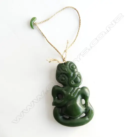 A contemporary Māori carved pounamu hei tiki,
